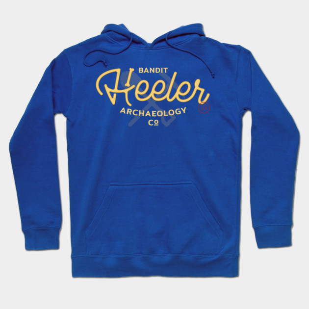 Blue graphic hoodie featuring "Heeler Archaeology" design, cozy cotton material, perfect for casual wear.