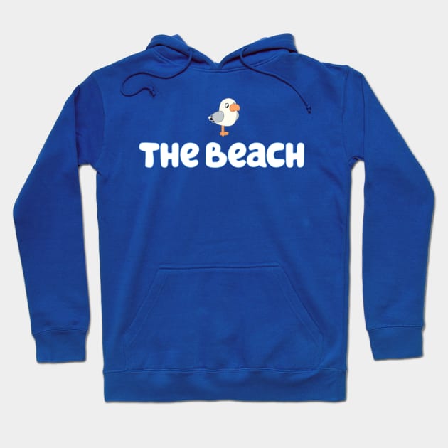 Blue hoodie with "The Beach" text and seagull graphic, casual style, cozy material, perfect for everyday wear.