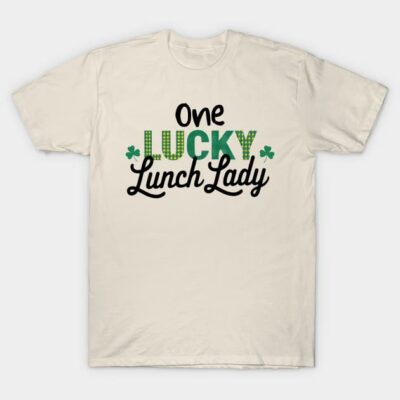 Beige "One Lucky Lunch Lady" T-shirt with green and black text, casual style, cotton material, ideal for everyday wear.