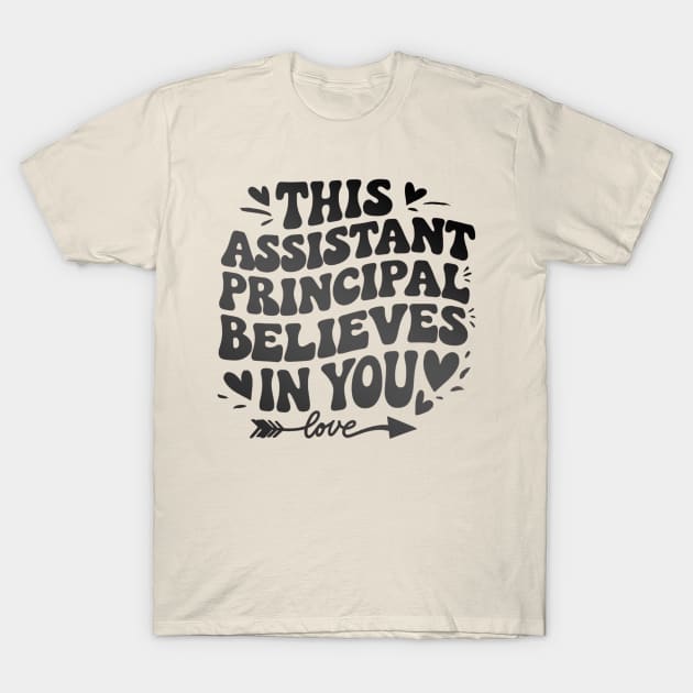 Cream T-shirt with motivational text "This Assistant Principal Believes in You," casual wear, cotton blend, unisex style.