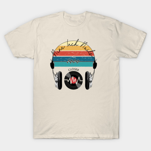 Cream retro music-themed T-shirt with colorful stripes, headphones, and vinyl record graphic, perfect for casual wear.