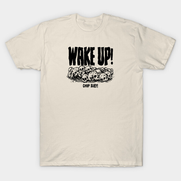 Beige graphic t-shirt with bold "Wake Up!" text and skull design, casual style, soft cotton material for everyday wear.