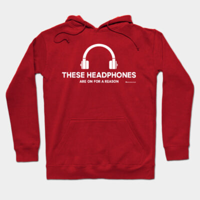 Red hoodie with headphone graphic and "These Headphones Are On for a Reason" text, cotton blend, casual wear.