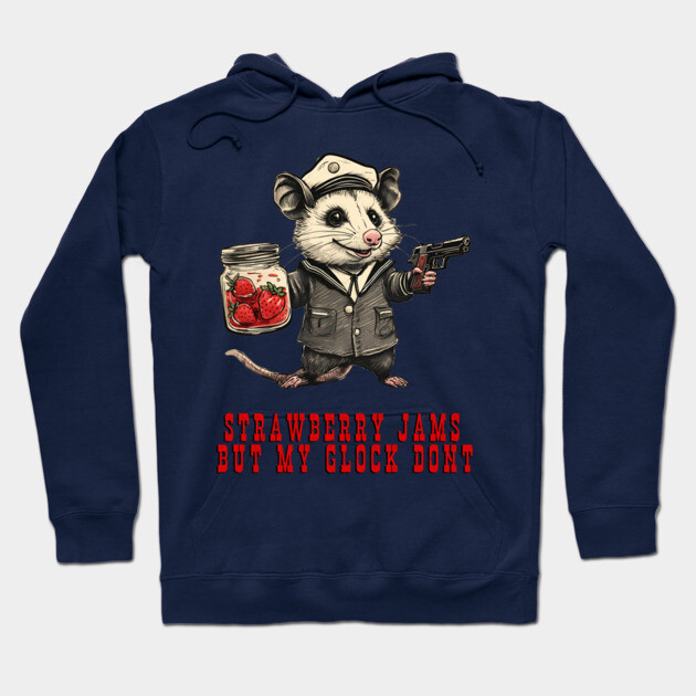 Navy blue hoodie with playful opossum graphic, text "Strawberry Jams" in red, casual style, cotton blend material.