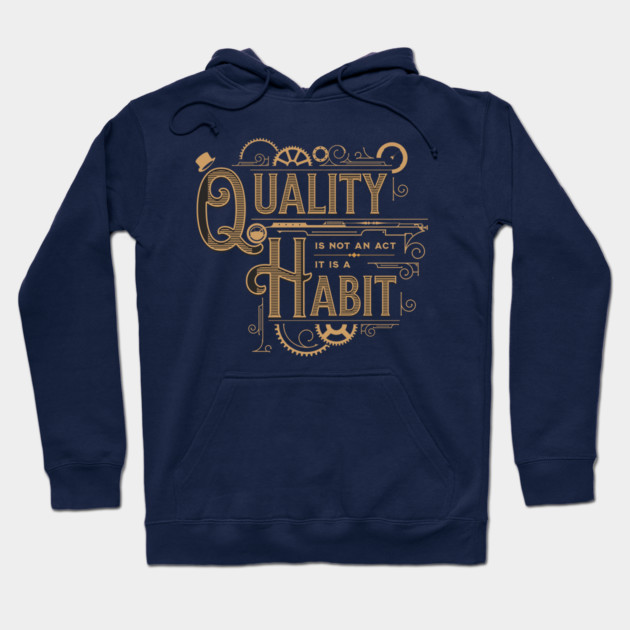 Navy blue hoodie with "Quality is Not an Act, It is a Habit" design in gold, casual style, cotton blend material.