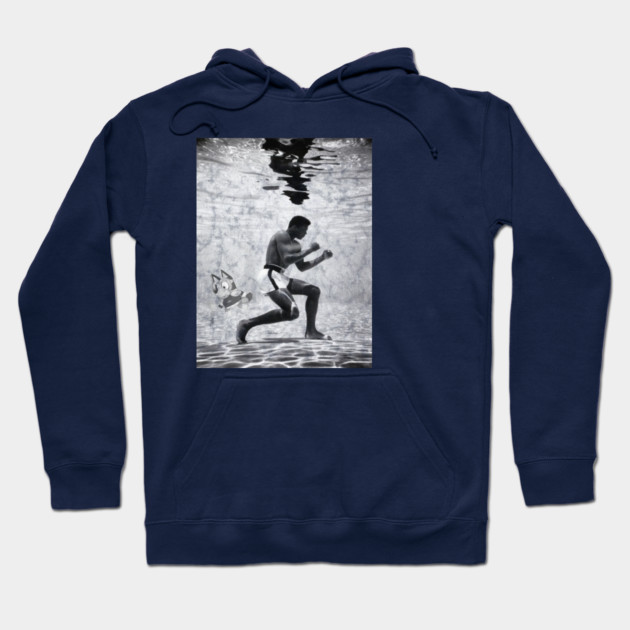 Navy blue hoodie featuring artistic underwater boxing design, perfect for casual wear, soft cotton blend material.