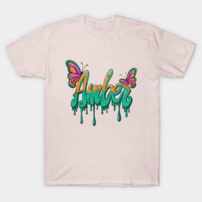 Pastel pink T-shirt with colorful butterfly design and dripping text, casual cotton wear for everyday use.