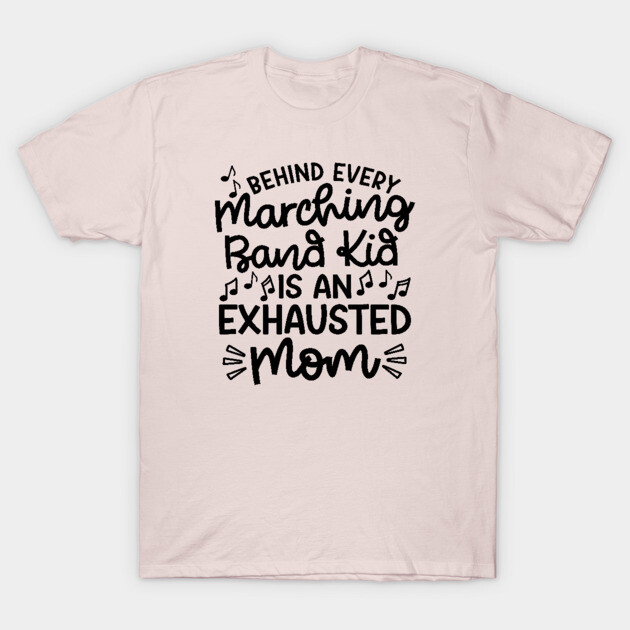 Pink t-shirt with black text "Behind Every Marching Band Kid Is an Exhausted Mom," casual wear for music-themed occasions.