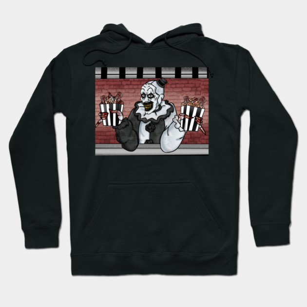 Black cotton hoodie with spooky clown graphic, featuring popcorn design. Perfect for casual wear and themed events.