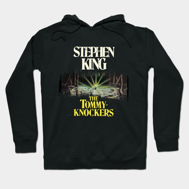 Black hoodie with "The Tommyknockers" print, featuring a forest scene. Comfortable cotton blend, perfect for casual wear.