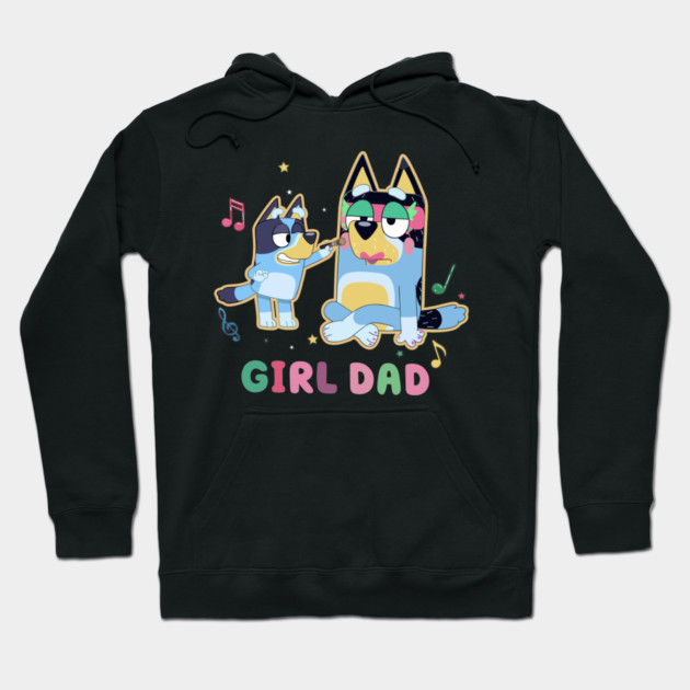 Black hoodie with playful cartoon dog design, "Girl Dad" text, colorful musical notes, casual wear.