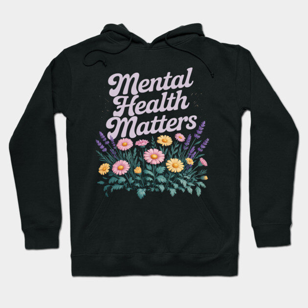 Black hoodie with "Mental Health Matters" text and colorful floral design, perfect for casual wear and self-expression.