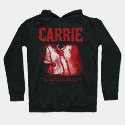 Black hoodie with bold red graphic text "CARRIE" and artistic face design, perfect for casual wear and fan apparel.