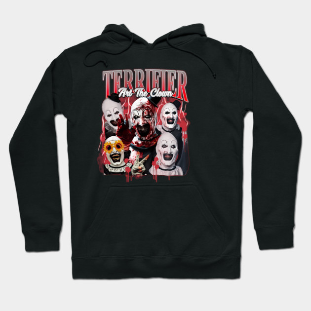 Black hoodie featuring a horror-themed clown graphic, perfect for Halloween or casual wear, cotton material, unisex design.