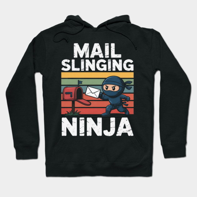 Black hoodie with "Mail Slinging Ninja" graphic, featuring cartoon ninja and mailbox, cotton material, casual wear.