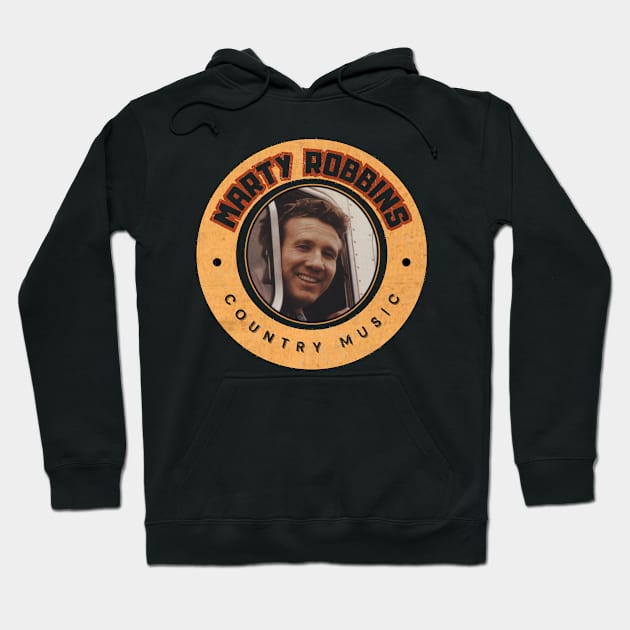 Black hoodie with vintage country music graphic design, featuring text in orange circle. Cozy cotton blend material.