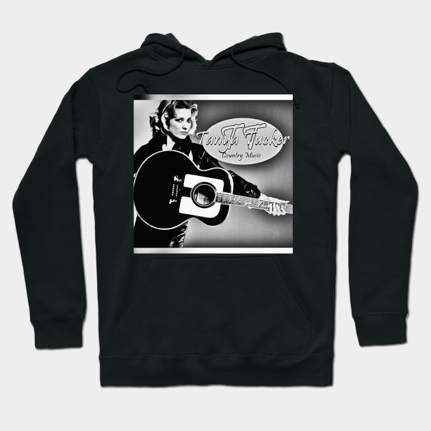 Black hoodie featuring vintage guitar print, ideal for music lovers. Cozy cotton blend for casual wear.