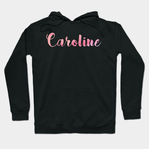 Black hoodie with pink cursive text, cozy cotton material, casual unisex style, perfect for everyday wear.