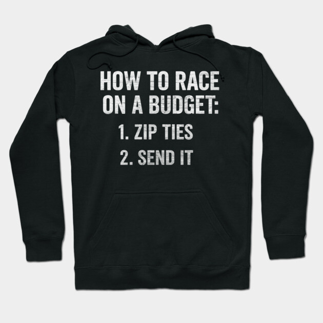 Black hoodie with "How to Race on a Budget: 1. Zip Ties 2. Send It" text, casual style, cotton material, unisex.
