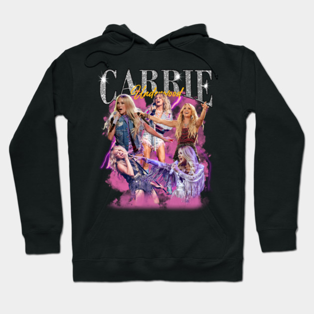 Black hoodie with colorful graphic design featuring energetic performance scenes, ideal for casual wear.