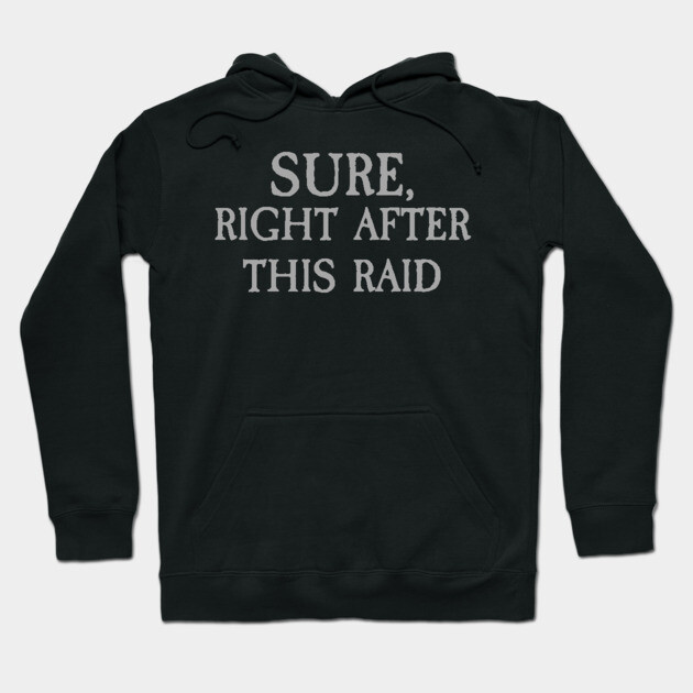 Black hoodie with playful text "Sure, Right After This Raid," casual style, perfect for gamers, cozy cotton material.
