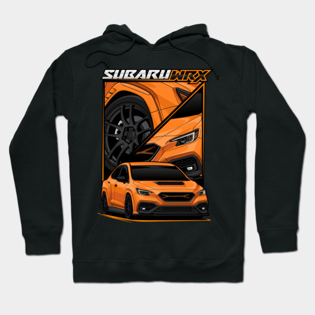 Black hoodie with orange Subaru WRX graphic, featuring sporty car design. Ideal for car enthusiasts. Cotton material.