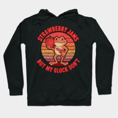 Black hoodie with retro-style frog print, "Strawberry Jams But My Glock Don't" text, casual wear, cotton blend.