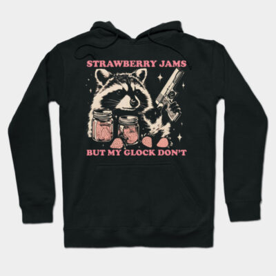 Black hoodie with raccoon graphic, jars of strawberry jam, and a playful slogan. Casual wear, cotton material.