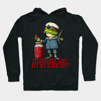 Black hoodie with a quirky frog graphic, featuring a jar of strawberry jam and humorous text. Casual and fun style.