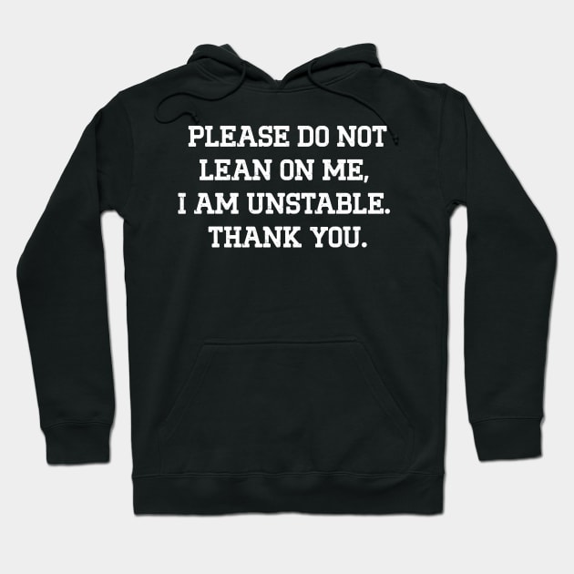 Black hoodie with humorous text, "Please do not lean on me, I am unstable. Thank you." Casual style, cozy material.