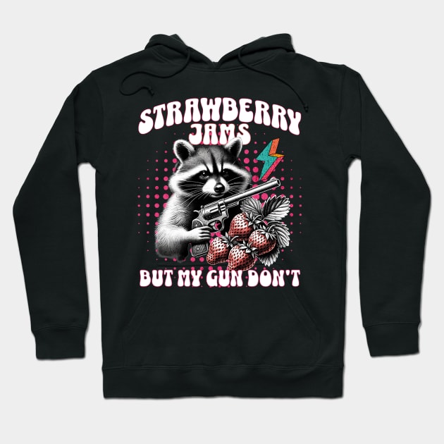 Black hoodie with raccoon, strawberries, and text design. Fun and quirky style, perfect for casual wear.