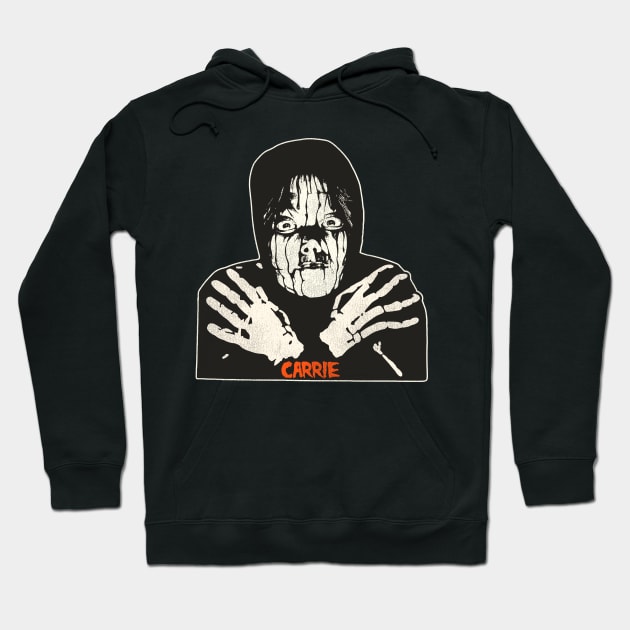 Black hoodie with horror graphic and "Carrie" text, perfect for casual wear, cotton blend, unisex design.