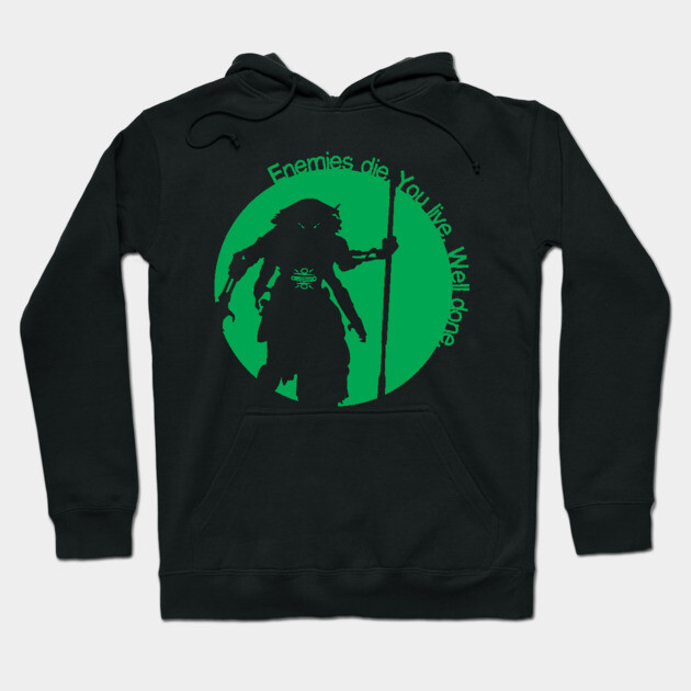 Black graphic hoodie with green warrior silhouette and motivational text, ideal for casual wear, cotton blend material.
