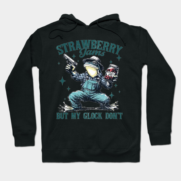 Black hoodie with "Strawberry Jams" graphic, featuring a quirky design. Casual style, perfect for everyday wear.