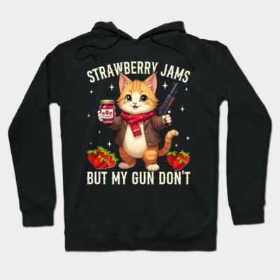 Black hoodie with cute cat print, holding jam and toy gun, text reads "Strawberry Jams But My Gun Don't," casual style.