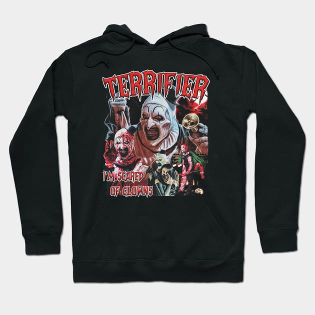 Black horror-themed hoodie with clown graphic, bold "Terrifier" text, and "I'm Scared of Clowns" slogan, ideal for fans.