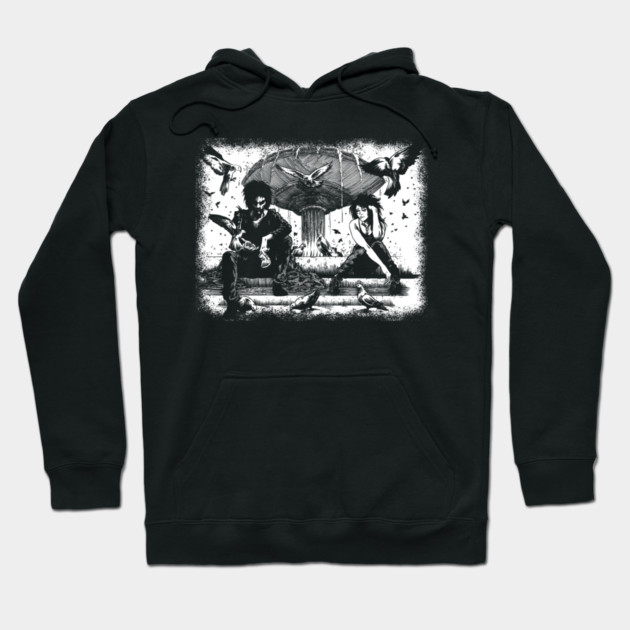 Black cotton hoodie with artistic graphic design, featuring detailed monochrome illustration, perfect for casual wear.