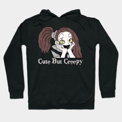 Black hoodie with "Cute But Creepy" graphic, featuring a cartoon character. Perfect for casual wear and cozy style.