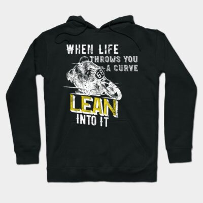 Black hoodie with motivational motorcycle graphic, text "When Life Throws You a Curve, Lean Into It," casual wear.