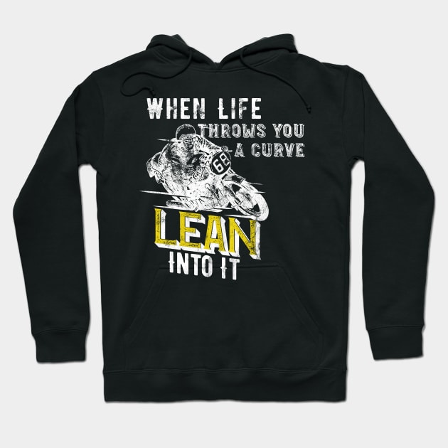 Black hoodie with motivational motorcycle graphic, text "When Life Throws You a Curve, Lean Into It," casual wear.