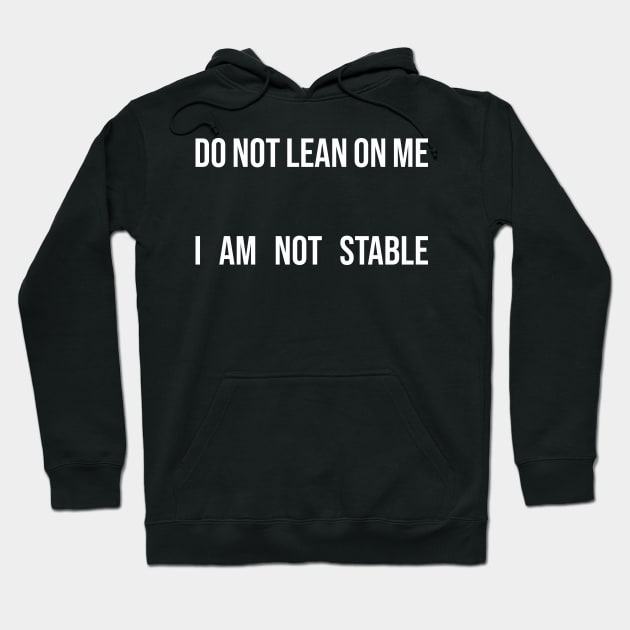 Black hoodie with humorous white text "Do Not Lean On Me, I Am Not Stable," casual wear, cotton blend.