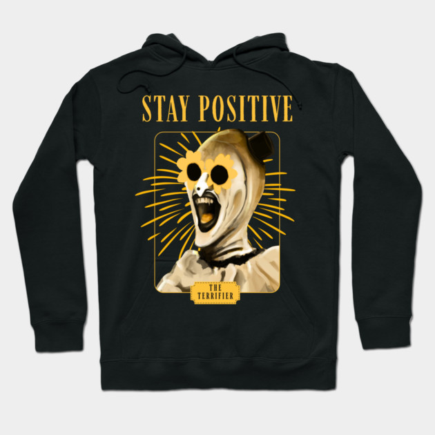Black hoodie with "Stay Positive" graphic, featuring a bold design. Cozy cotton material, perfect for casual wear.