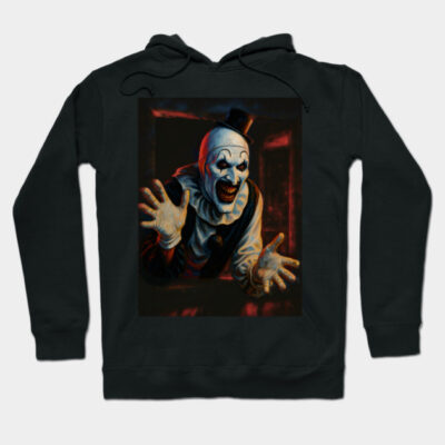 Black hoodie with creepy clown design, long sleeves, cotton blend, horror-themed casual wear.