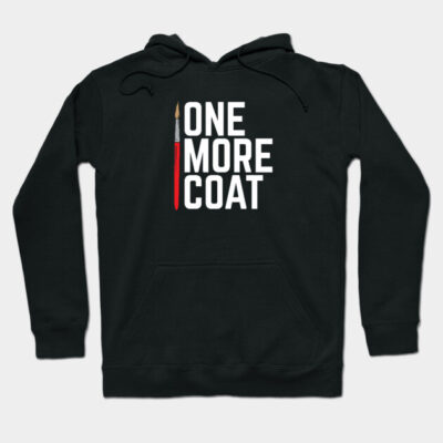 Black hoodie with "One More Coat" text and paintbrush graphic, perfect for artists, made from soft cotton blend.