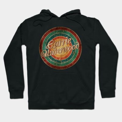 Black hoodie with retro circular graphic design, cozy cotton blend, casual wear for all seasons.
