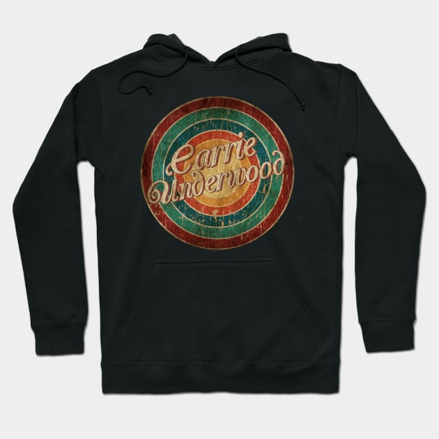 Black hoodie with retro circular graphic design, cozy cotton blend, casual wear for all seasons.