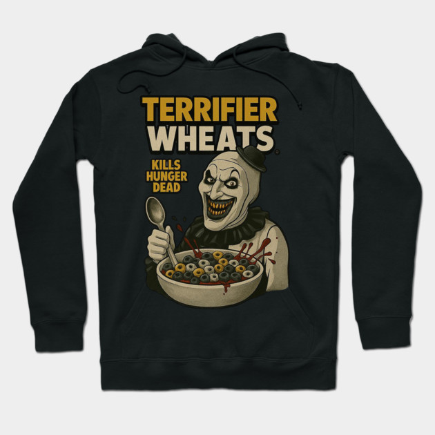 Black hoodie with graphic illustration of a clown holding cereal bowl, text reads "Terrifier Wheats". Ideal for casual wear.