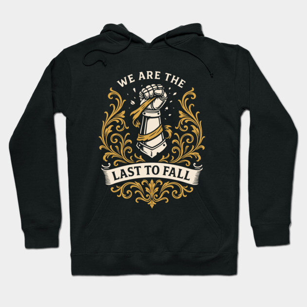 "Black hoodie with 'We Are the Last to Fall' design, featuring a medieval armor motif and intricate gold detailing."