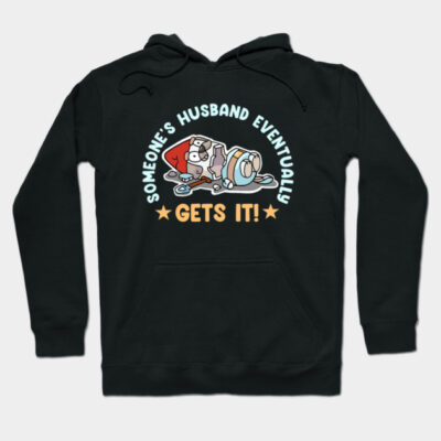 Black hoodie with humorous graphic and text, "Someone's Husband Eventually Gets It!" Cozy cotton material, casual style.