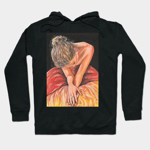 Black hoodie with abstract art print in vibrant red and yellow tones, perfect for casual wear and artistic expression.